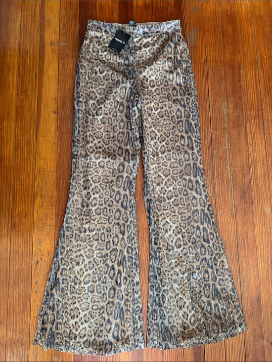 Forever 21 Pants - New with tags Forever 21 Leopard-Print Sequin Flare Pants Size Small